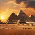 Ancient Egyptian pyramids at sunset with camel caravan crossing desert - English listening practice about ancient civilizations